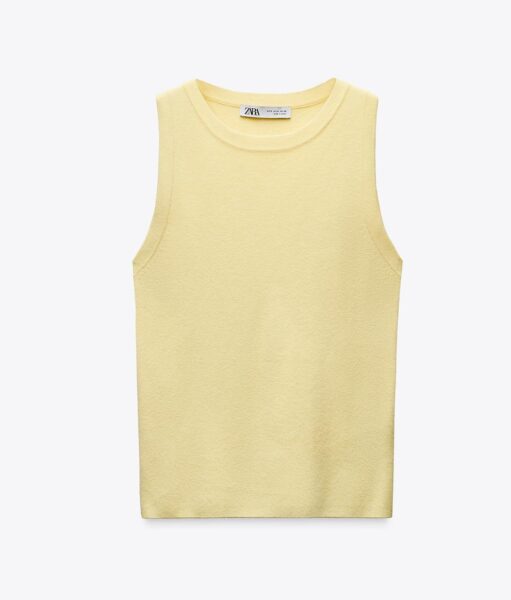 Top sweterkowy w odcieniu butter yellow.