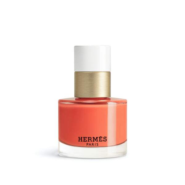 Orange Tulipe 32: Flakon lakieru Hermès w żywym, tulipanowym pomarańczu; ciepły, intensywny odcień idealny na lato.