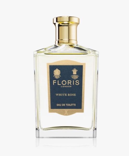 Elegancki flakon perfum Floris London White Rose Eau de Toilette z prostokątną butelką, granatowo-złotą etykietą i złotym korkiem.