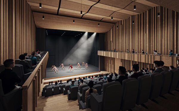 Sala teatralna. Wystrój nowoczesny, dużo drewna.