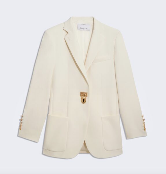Biała marynarka ze złotą kłódką od Schiaparelli /fot. Schiaparelli.com