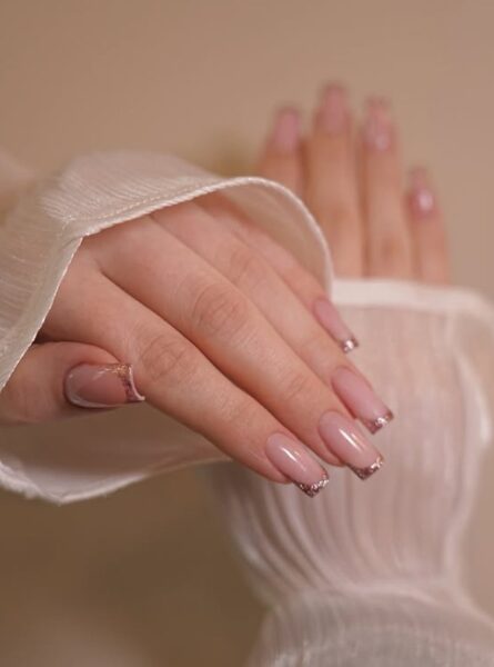 Glitter french manicure.